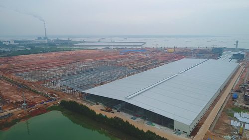 【景典佳作】全球最大玻璃工厂!北海信义玻璃产业园钢结构厂房封顶